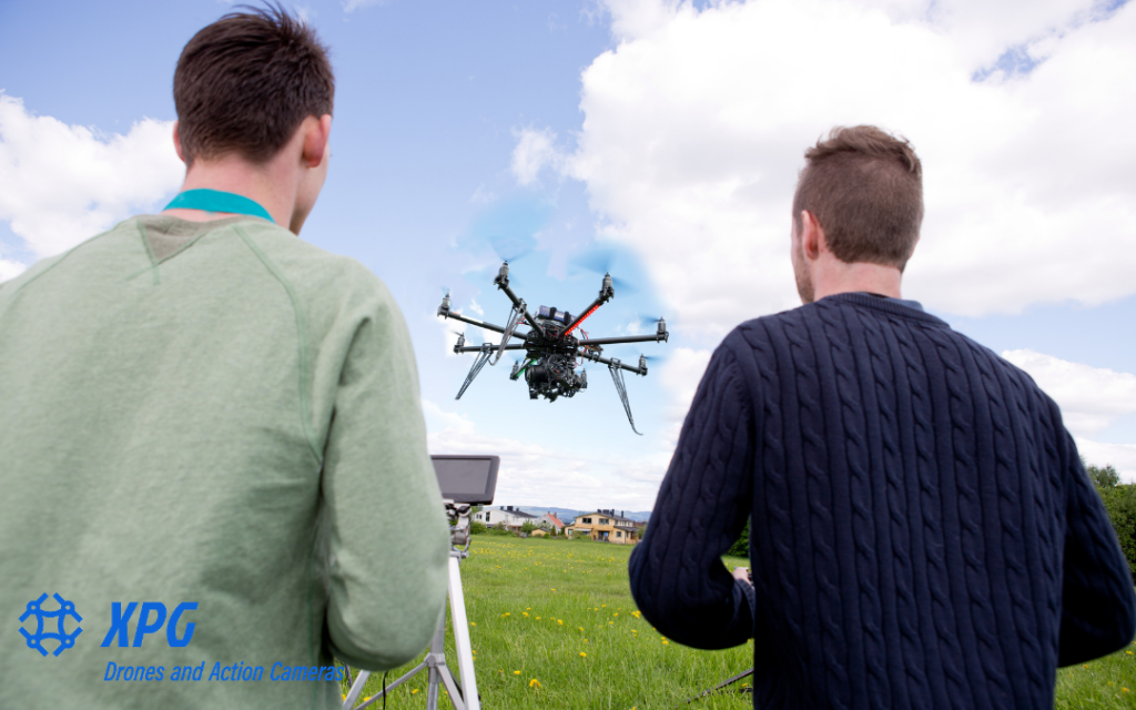 This image shows professional drone pilots flying a drone.